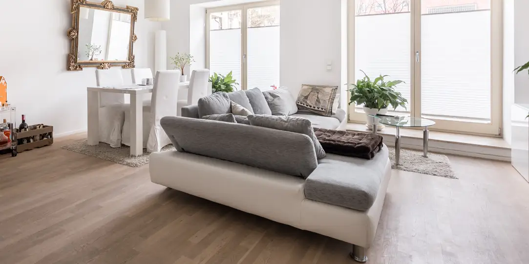 We spent over $12,000 replacing our carpets with vinyl-plank flooring. It looks nice, but I regret it every day.